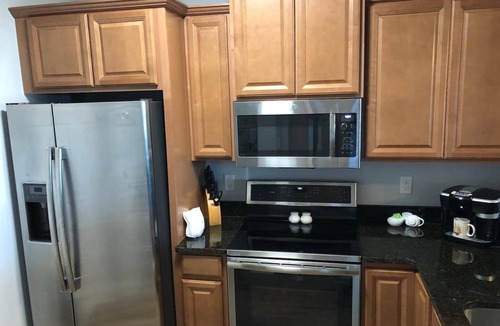 Bouchelles Island Condo | Tropical Breeze Getaway! Watch the Shuttles from the Balcony! New Smyrna Beach!