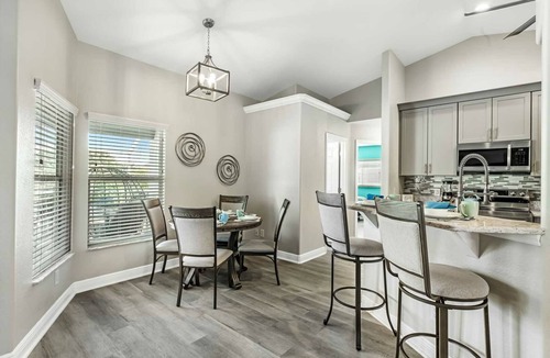 Mariner House | Tropical Gem! Sparkling Saltwater Pool Peaceful Canal with Dock Luxe Comfort