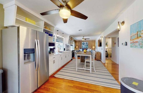 Palm Island House | Tropical Palm Island home steps from the beach with grill, outdoor shower, dock