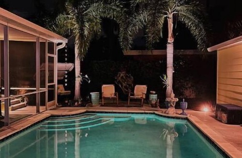 Parrot Cove House | Tropical Paradise, Beautiful Pool Home.