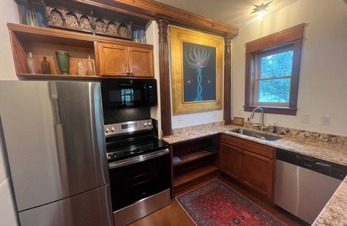 DeLand Cottage | Unique 3-bed mini-resort in downtown DeLand with natural pool and waterfalls.