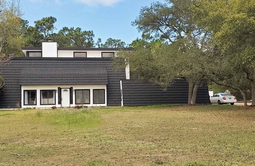 Navarre House | Updated dog-friendly home with private outdoor pool, patio, fireplace, W/D, AC