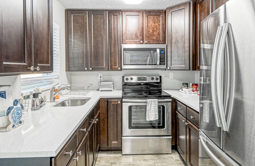 Juno Ridge House | Updated double-duplex with 2 kitchens, 2 lanais, grills, AC, & W/D - near beach