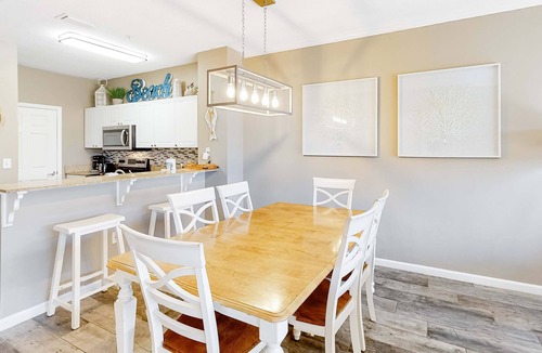 Frangista Beach Condo | Updated ground floor beachside condo with private beach access & patio