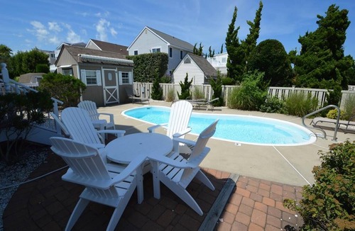 Avalon House | Vacation by the beach and enjoy the private backyard pool. Pets considered, too.