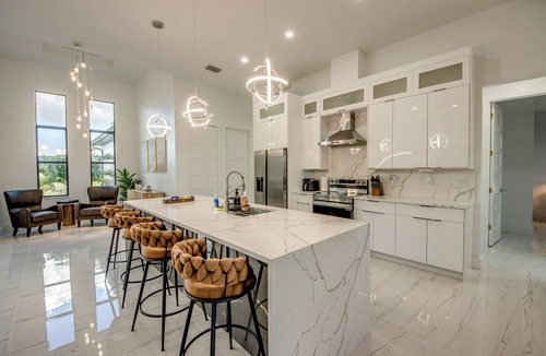 Pelican Villa | Villa Coral Bliss - Awesome 4 BR/3 bath waterfront villa w. heated pool, hot tub, kayaks, fishing poles, bikes