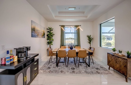 Pelican Villa | Villa Coral Bliss - Awesome 4 BR/3 bath waterfront villa w. heated pool, hot tub, kayaks, fishing poles, bikes