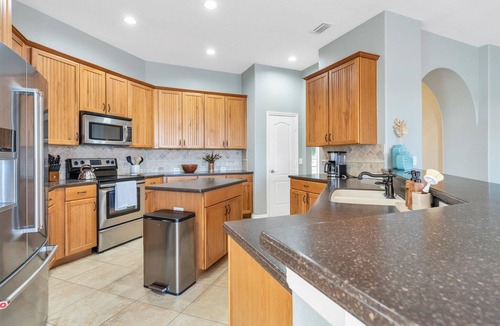 Trafalgar Villa | Villa Pelican - 3 beds/2.5 baths heated pool home in Cape Coral - Palmetto Pine Golf Club