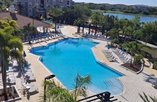 Florida Central Atlantic Coast Condo | Vista Cay Luxury Executive. Walk to Epic Universe and the OCCC