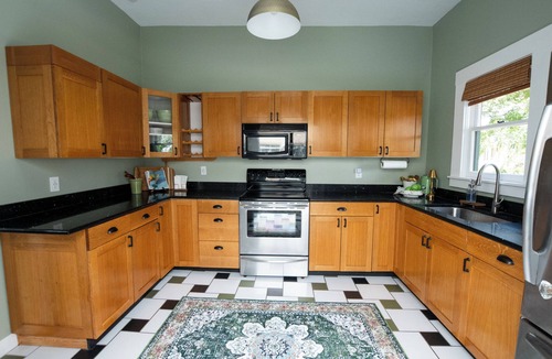 Seminole Heights House | Walkable Tampa Bungalow near all the cafés + nightlife! Thoughtfully renovated w/modern comforts while preserving its vintage charm; historic Tampa retreat is steps from trendy breweries and restaurant & local favorites. Plus is has 3 king beds!