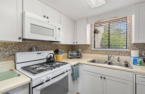 Panama City Beach House | ❃ Walkable to Food & Fun ❃ Beach-Front Pool ❃ Canal-Side Home ❃ No Pet Fee