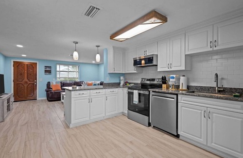 Port Richey Apartment | Waterfront! 2BR w/Firepit & Grill!
