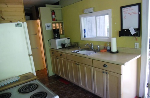 Mears Cottage | Waterfront Cabin on Silver Lake Channel. Row or Motor boat to the Sand Dunes.
