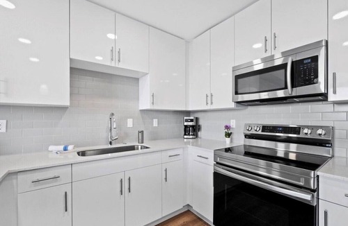 Central Sarasota Condo | Waterfront Coastal Elegance Top Floor at The Strand