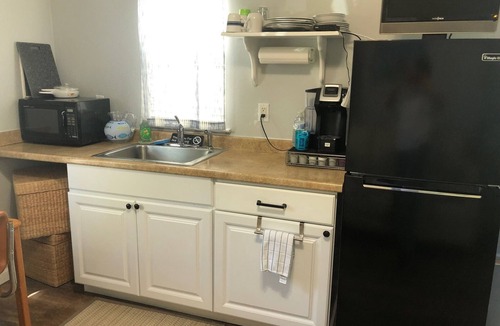 Innerarity Point Cottage | Waterfront Cozy Cottage, Walk to restaurants, yet private waterfront retreat.