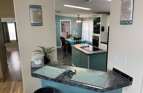 Weeki Wachee Gardens House | Waterfront: Jacuzzi, SUP, Kayaks, Big H2O Mat, Fun Room, Ping Pong, Dock & Canoe