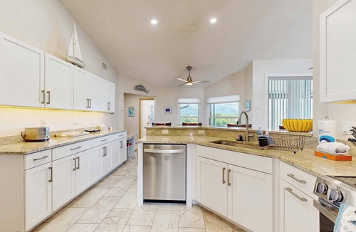 Bay Harbor Estates House | Waterfront pool home, family friendly, close to beaches with AC, WD and WIFI