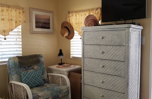 Whitney Beach House | Waterview bedroom, great location steps from Bridge Street