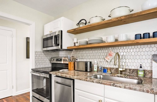 Oakford Park House | Whimsical Midtown home with covered porch, tennis & W/D - dog-friendly