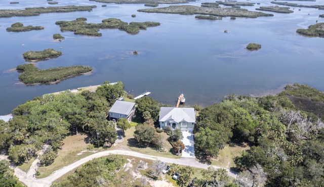 2 Waterfront Homes w Pvt Docks, Kayaks, Outdoor Spaces, Gulf Views