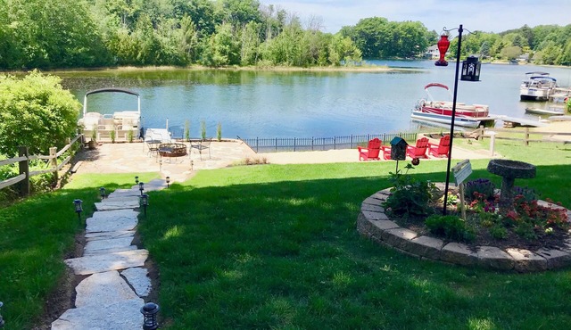 Authentic Log Cabin on Beautiful Silver Lake in Traverse City MI. Pet Friendly!