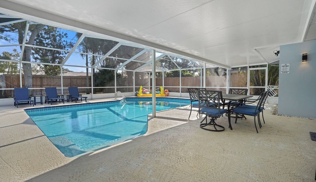 Beach Retreat - 3/2 family oasis, heated pool Sleeps 8 - 15 min to beaches