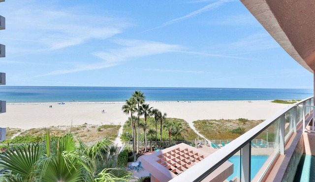 Beachfront condo with multiple balconies heated pool gym hot tub and AC