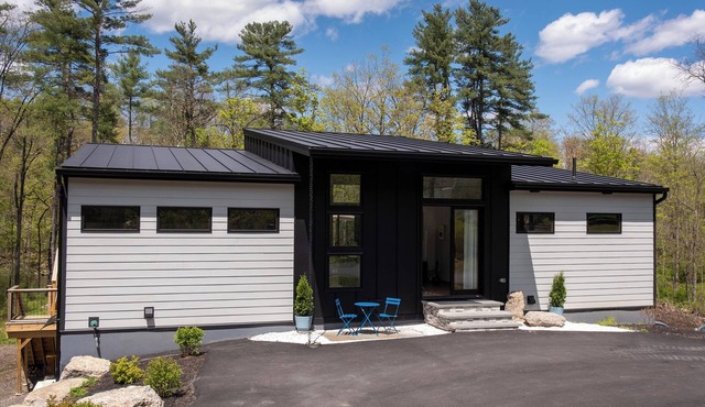 Brand new riverfront home with private beach, modern, serene, central HV spot.