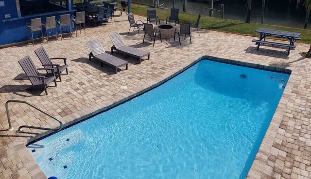 Cabana Escape – Waterfront Oasis with Heated Pool and Spacious Outdoor Living