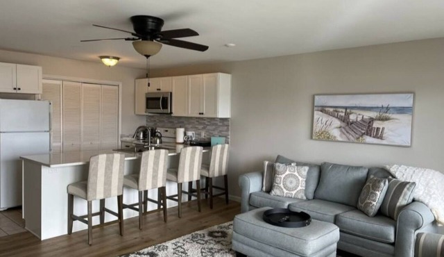 Charming 1 bedroom, 1 bathroom condo with spacious kitchen and walkout patio