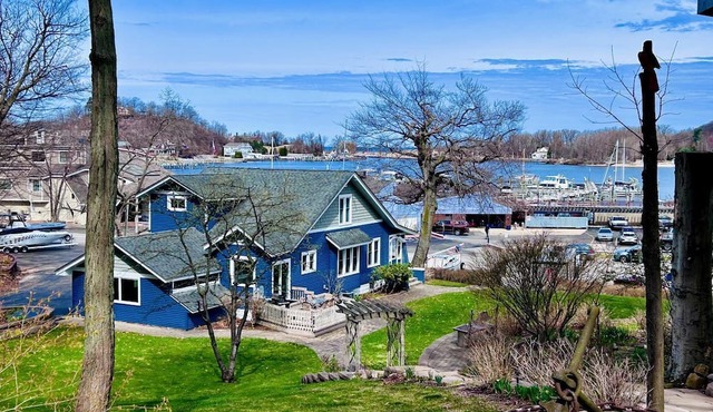 Charming Waterfront Cottage with Modern Remodel Overlooking Lake Macatawa Harbor, Near Macatawa, Michigan