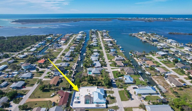 CLEAN,Great Location,Dockage Available,HEATED Pool,3 Units, HUGE Back yard.