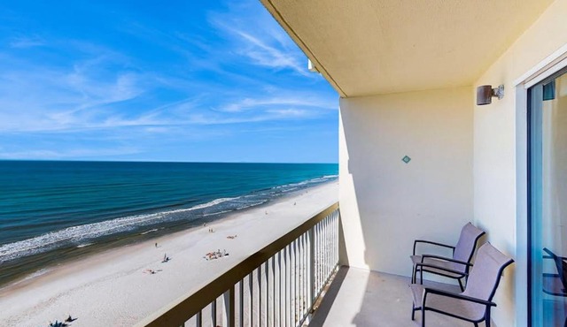 Colorful oceanfront condo with Gulf views on-site pools & hot tub