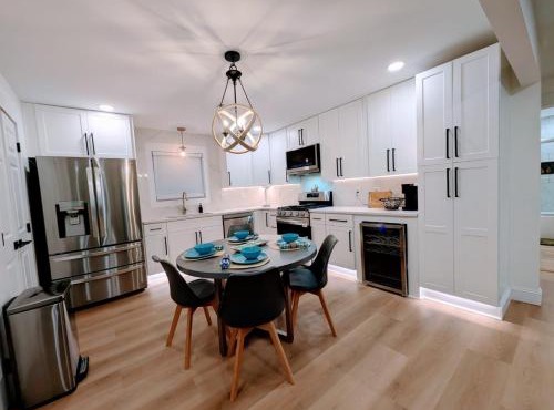Custom Design Kitchen King Beds Laundry Large TVs in Rome