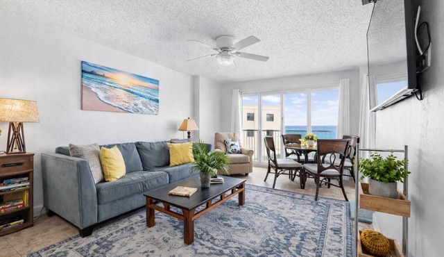 Enjoy stunning ocean views from the balcony, living room, dining area, and kitchen. This 2BR condo features a heated beachfront pool, fitness room, king beds in both bedrooms, and comfortably sleeps 4 in beautiful Daytona Shores.