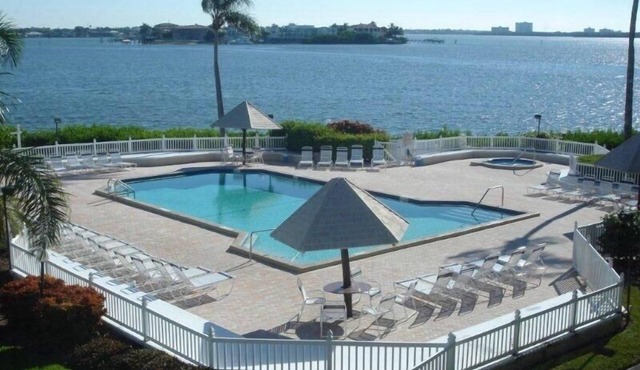 Escape To This Picturesque Bay Front Condo, Perfect For Couples Or Families.