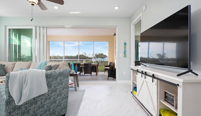 Exclusive Anna Maria Sound Waterfront Retreat with Shared Pool & Sunset Serenity