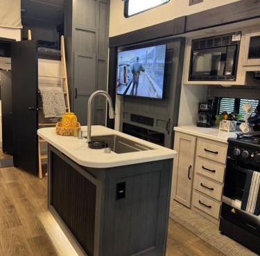 Extra large 4 bedroom with two full bath glamping rv with golf cart