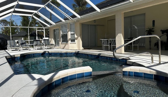 Family villa with great amenities, a luxurious pool, and stunning beaches!