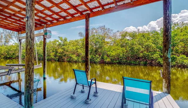 Fishing getaway with a pool, hot tub, game room, dock, and grill - dog-friendly