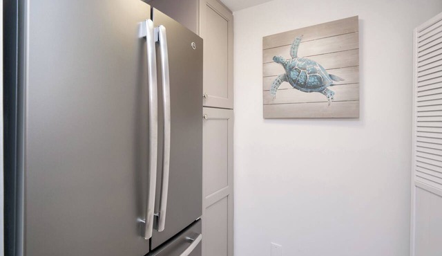 Gated community, private beach access, renovated condo!