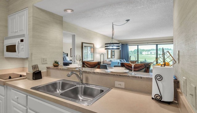 Golf Patio Condo | Work-Friendly Stay | 4 Queen Beds | Saddlebrook Resort | Optional Amenities