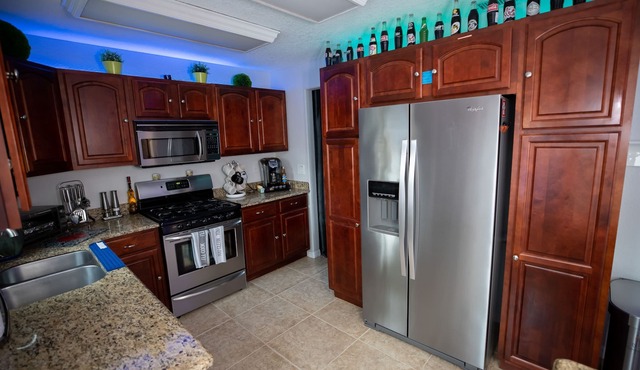 Gorgeous Urban Oasis W/hot Tub, Heated Pool And Private Movie Theater 3 Bedroom Home by RedAwning