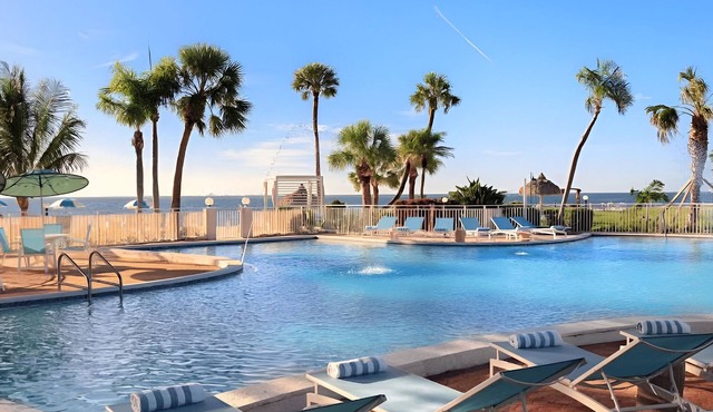 Gulf Coast Retreat | Lounge by Two Pools | Private Beach & Marina Access