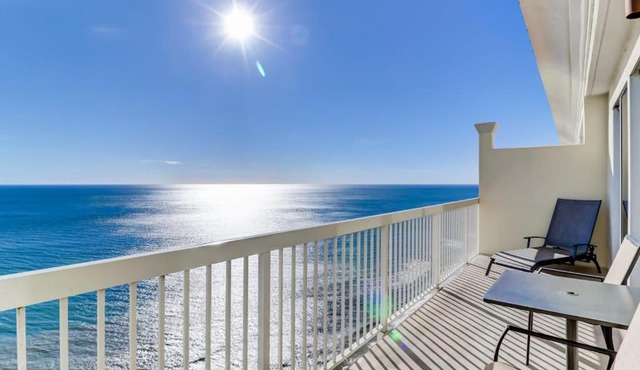 Gulf-front penthouse condo with pool hot tub fitness room & beach access
