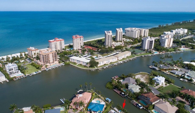 Hidden Gem on the Water: Luxury 3BR + Den Pool Home Near Vanderbilt Beach
