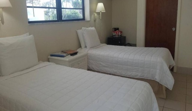 Island Getaway w/Access to Private Beach + Pool | Free Parking & Breakfast