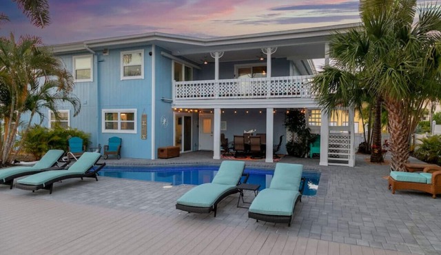 Island Homes-on canal w/dock and heated pool/5 min walk to beach