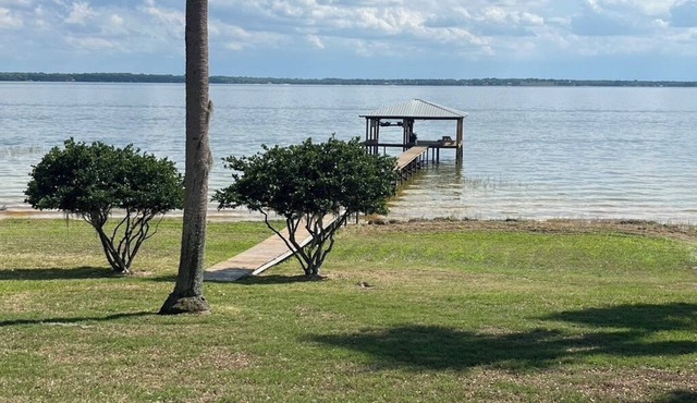 Lake Weir North Shore Private Gated Estate Home 105' Lake front w/private dock.