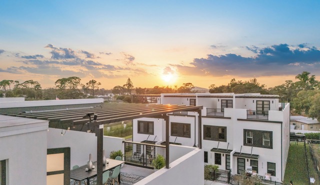 Luxury new construction town house, with roof top vibes, hot tub and pool